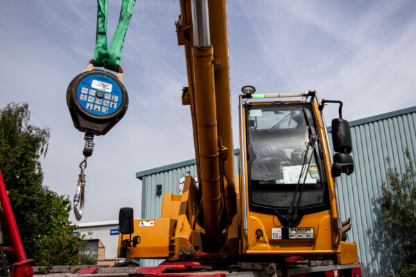 load cell on mobile crane hook in yard