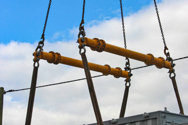 close up of specialist spreader beams used to lift machinery with a mobile crane