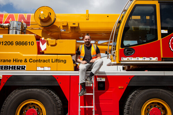 crane operator sitting on a crane