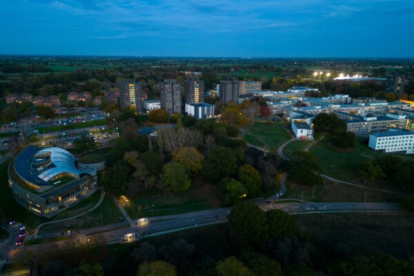 an aerial shot of colchester university at night time