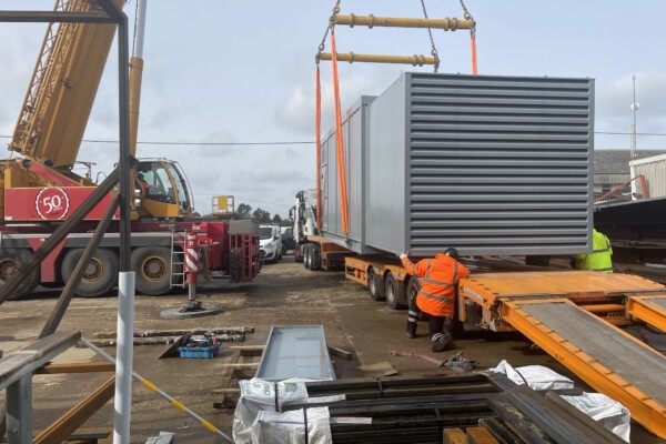 crane hire services for acoustic containers