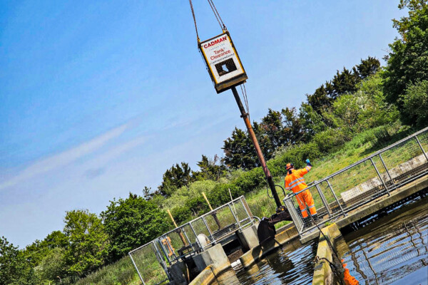 Close up of a grab on hire with a mobile crane operator