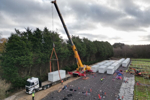 Crane lifting battery energy storage unit