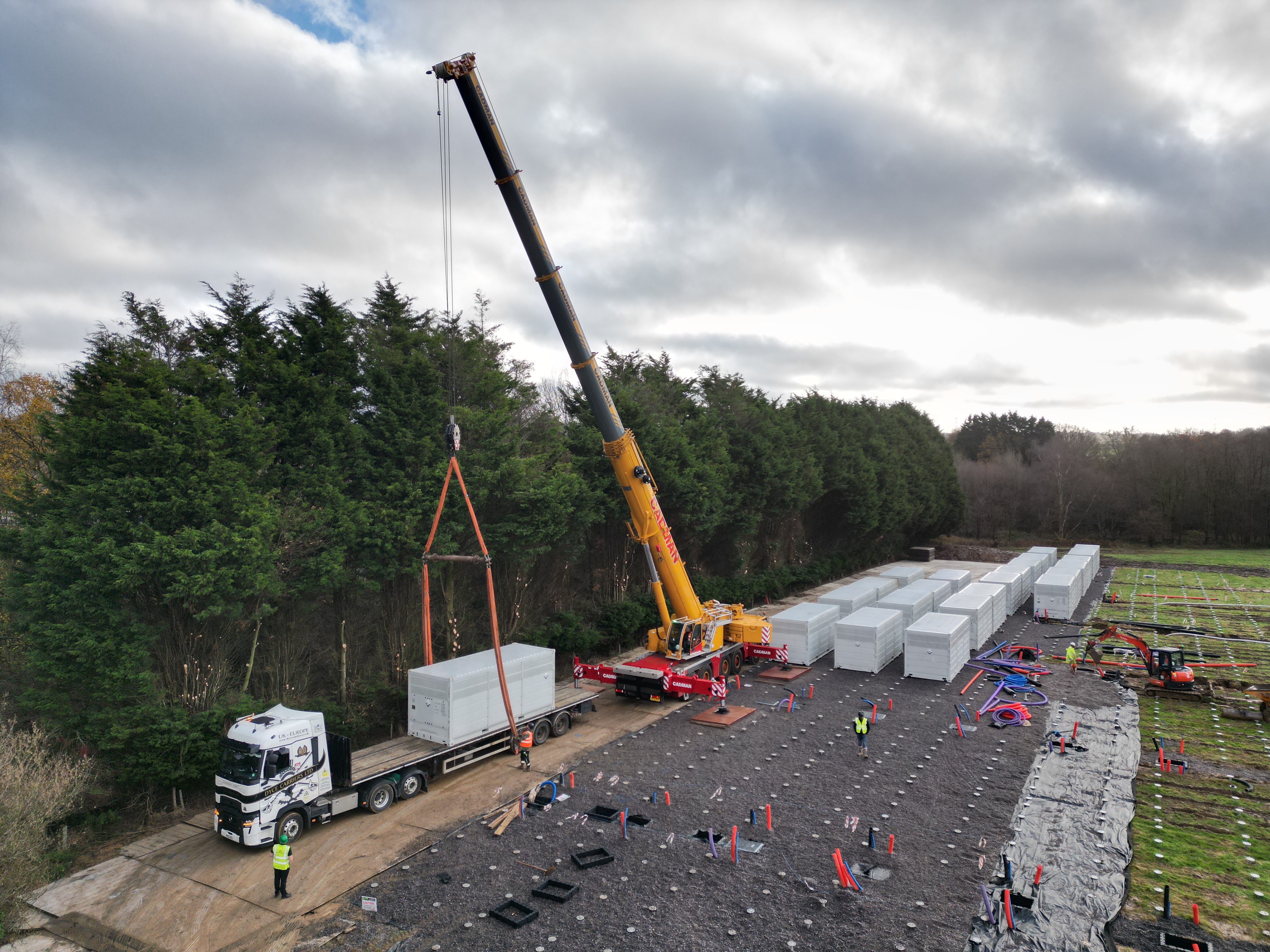 Crane lifting battery energy storage unit