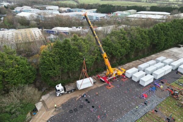Crane lifting battery storage unit