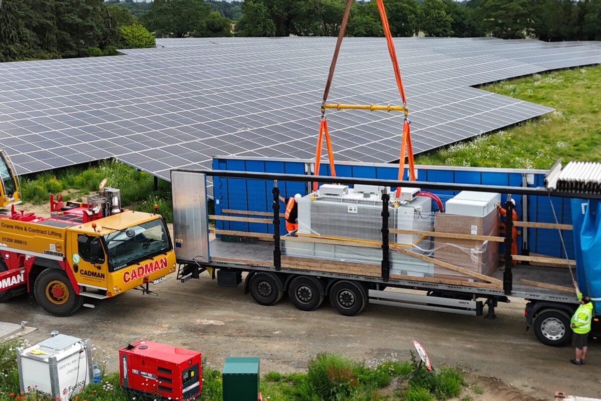 Crane Lifting transformer at solar farm