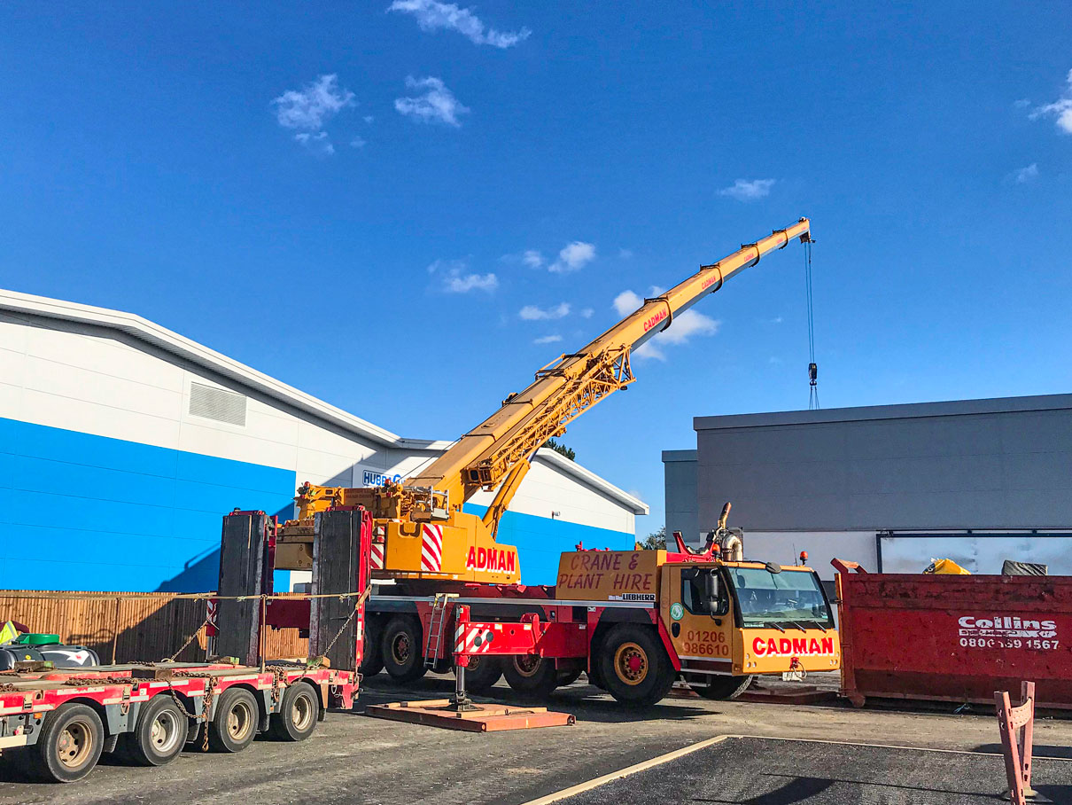 180-tonne mobile crane lifts HVAC units